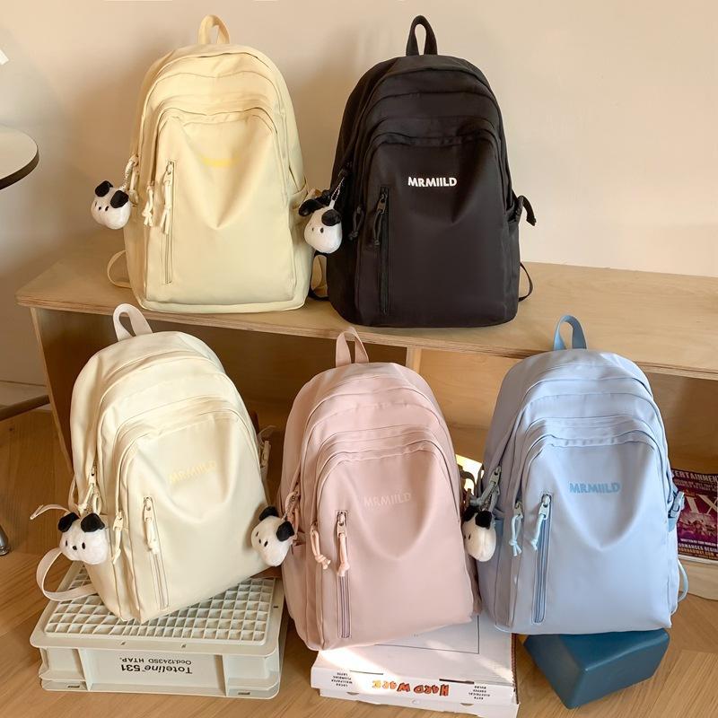 Student Schoolbag New Simple Backpack Large Capacity Junior High School Student Leisure Bag Going Out Light Backpack