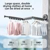 "Punch-Free Suction Cup Folding Clothes Rack - Telescopic Invisible Balcony Rod"