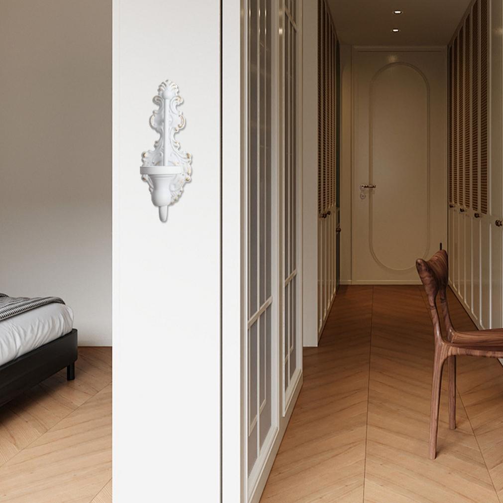 Vintage nástěnný svícen na úzké svíčky, starobílá litinová dekorace