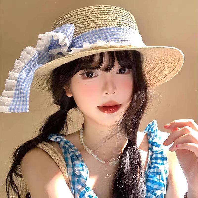Korean Version Spring and Summer Flat Top Top Top Hat Seaside Travel Vacation Sun Protection Beach Hat Bow Strap Straw Hat