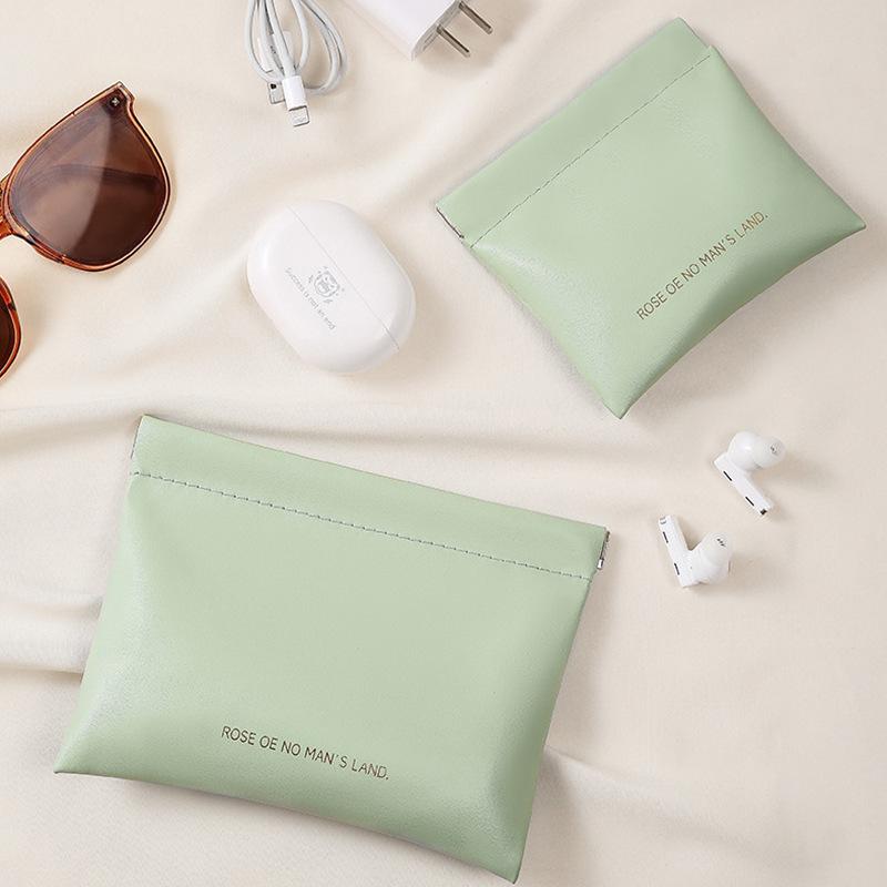 Portable Earphones, Charger, and Coin Storage Pouch with Auto Closure