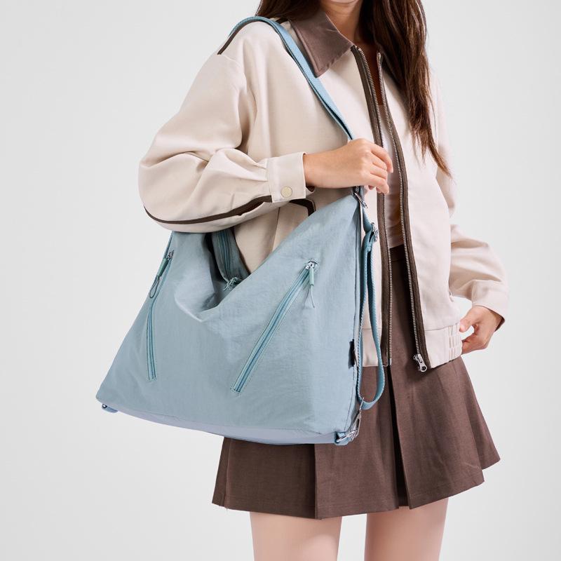 

2025 New Multifunctional Women s Canvas Shoulder Backpack - Large Capacity for Students and Commuters 34x15x34cm синій