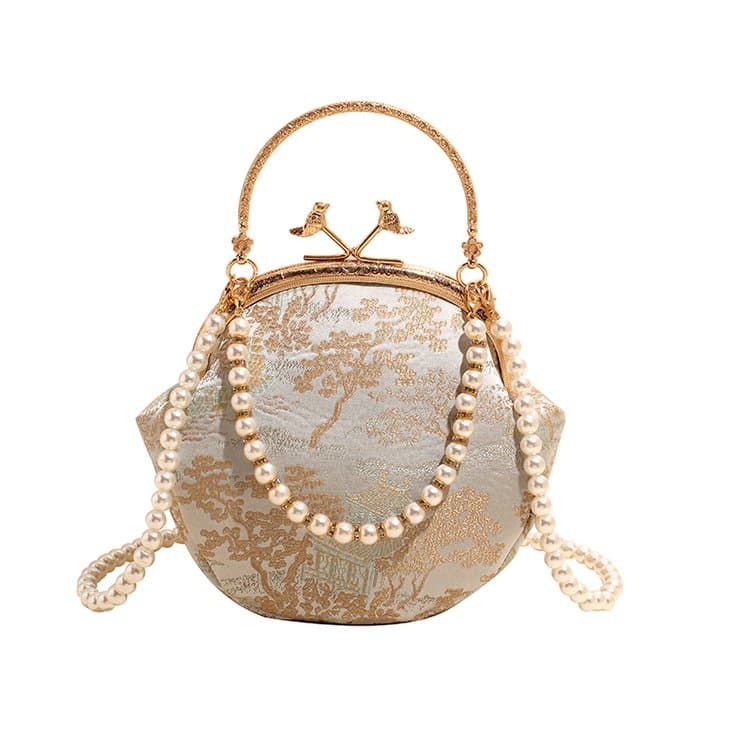 Rice gold national style jacquard pearl mouth gold bag