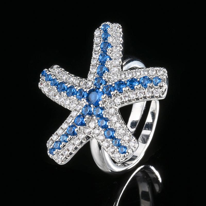 

Комплект из трех украшений, ожерелье в виде морской звезды, серьги-гвоздики, преувеличенная пентаграмма в женском стиле