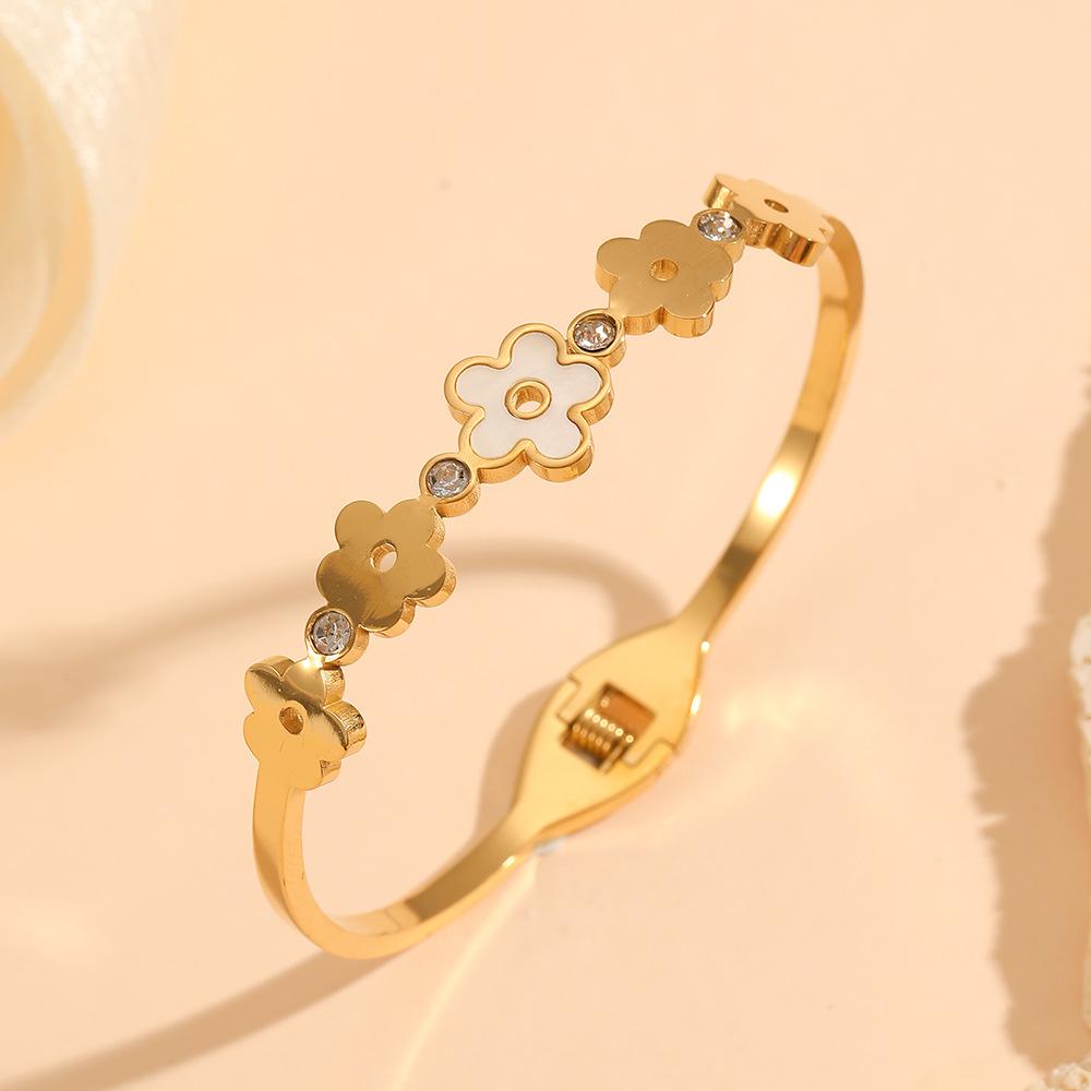 Gold-Plated Titanium Steel Bracelet with Diamond-Studded Flower Designs