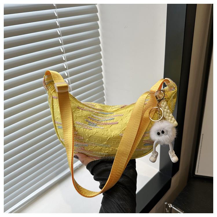 

Striped embroidered messenger bag 2024 summer new dopamine niche design nylon cloth wide shoulder strap casual dumpling bag Without pendant жовтий
