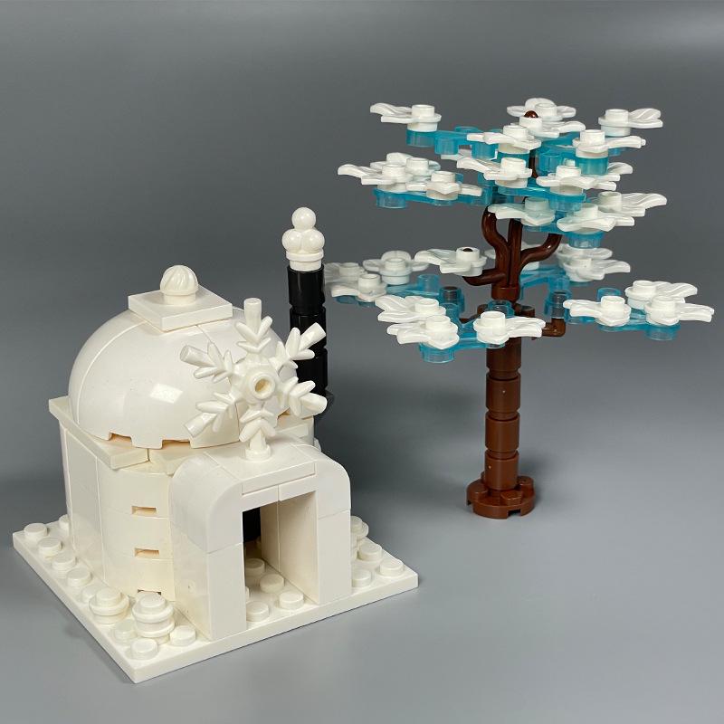 Beleuchtetes arktisches Tier-Baustein-Set: Pinguin, Eisbär, Husky & Wolf Iglu.