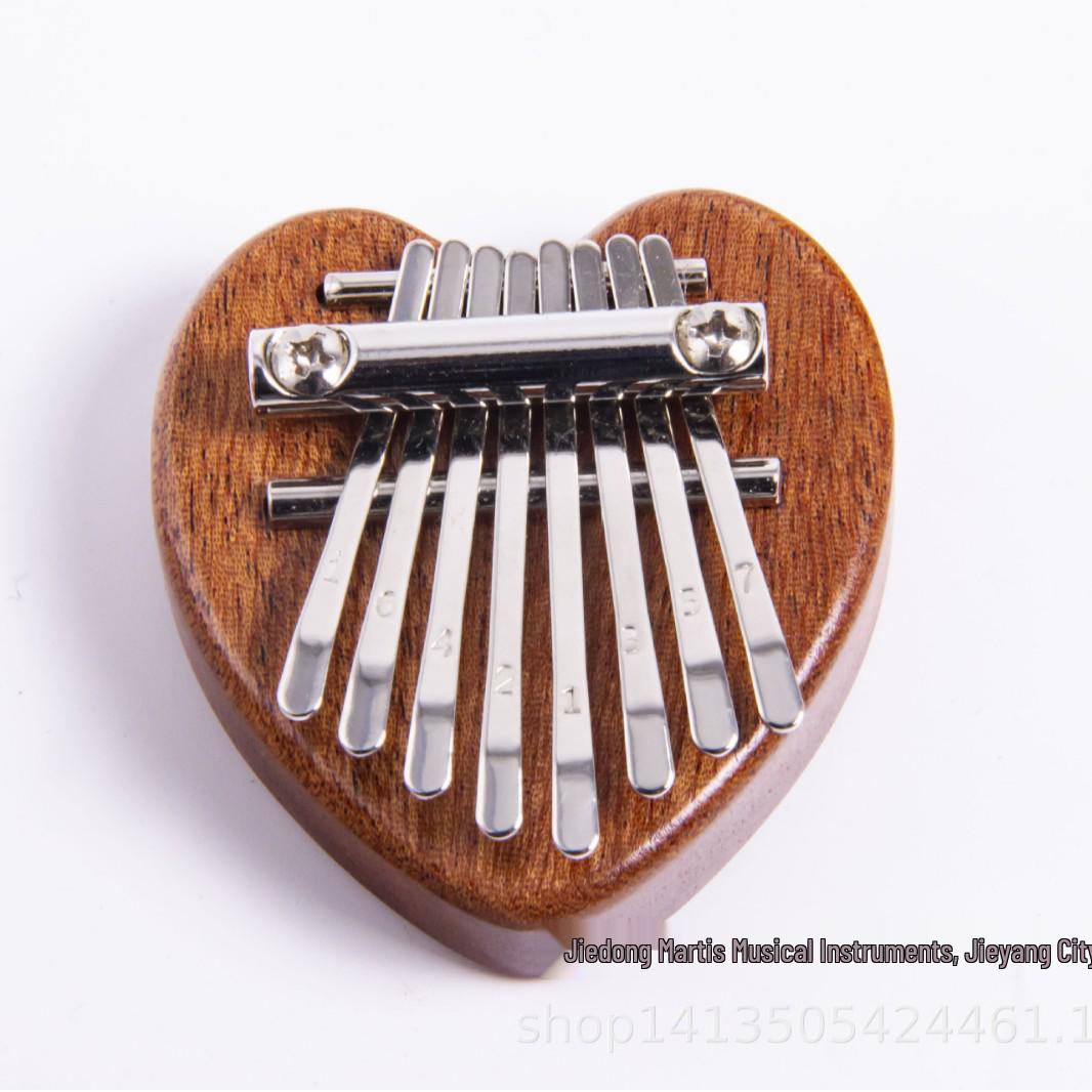 

Mini 8-Note Crystal Thumb Piano, Portable & Cute Pendant Musical Instrument