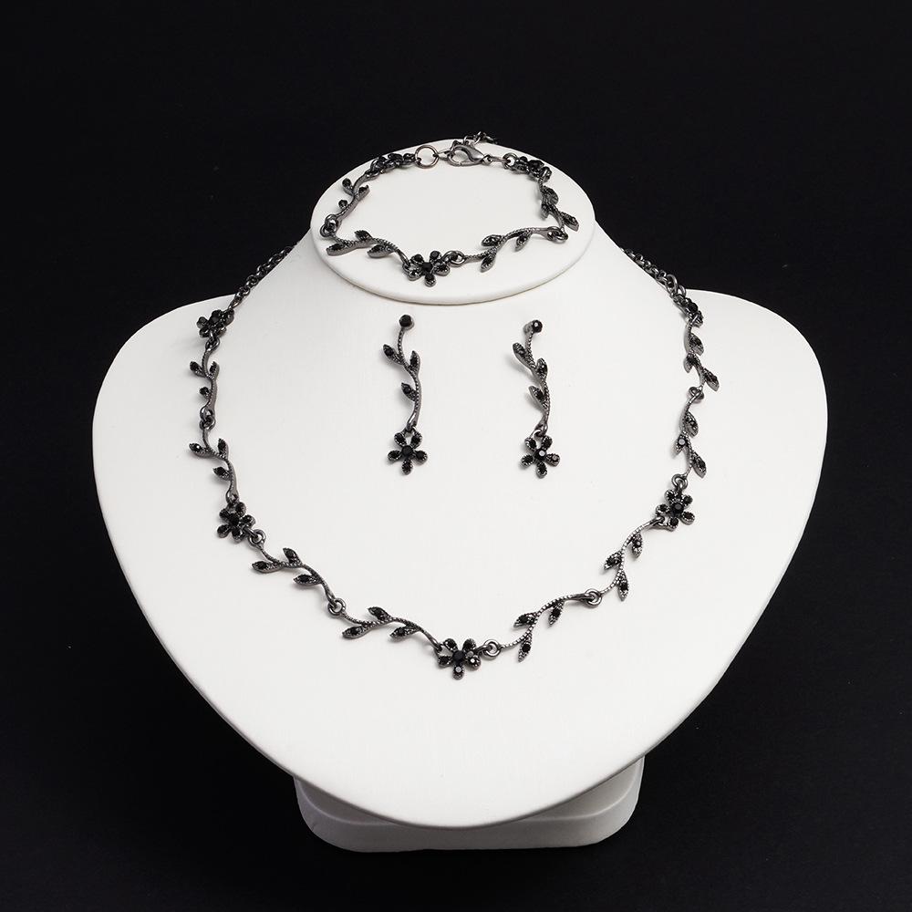 

Elegant Fashion Jewelry Set: European & American-Inspired Necklace, Earrings, Bracelet Trio.