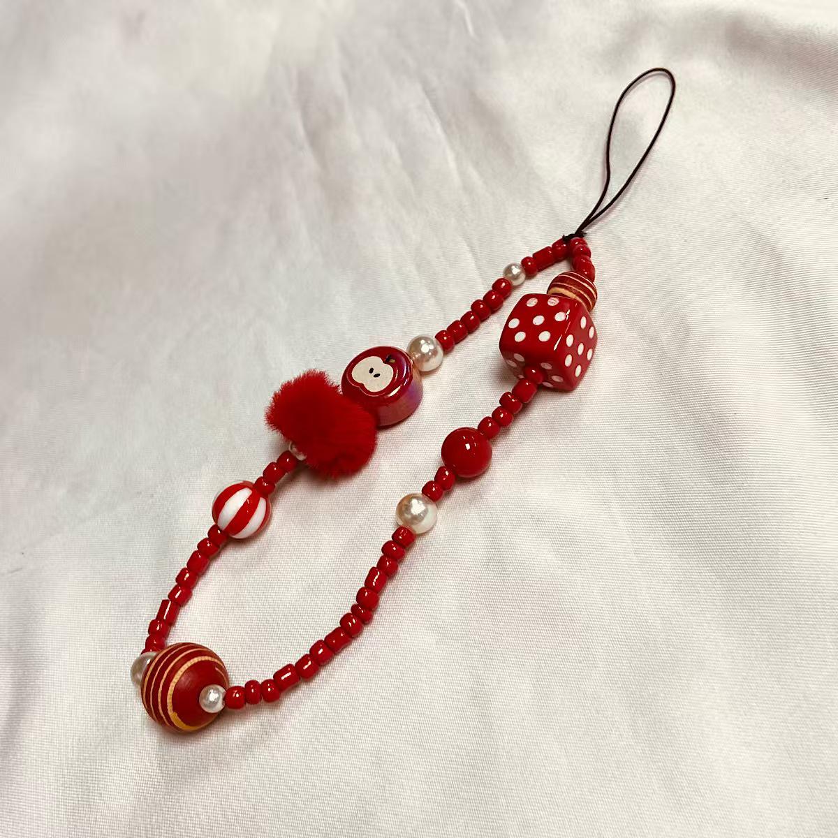 

Handmade Red Wool Beaded Wrist Strap for Camera or Phone