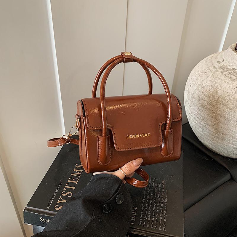 

Трансграничная мини-портативная маленькая сумка для женщин 2025 года, новая иностранная газовая горловина, красный конверт, универсальная сумка-мессенджер для студента коричневый