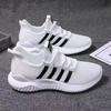 A spring breathable couple running shoes men's white shoes fashion trend casual shoes sports men's shoes
