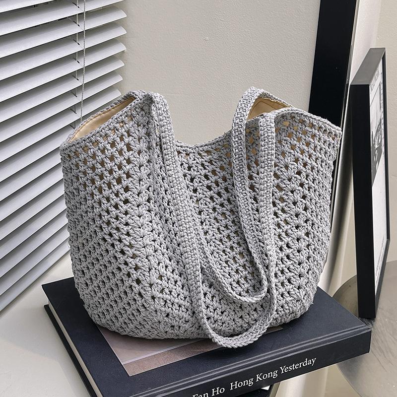 New Fashion Casual Lazy Wind Woven Tote Bag Commuting Light Hollow Armpit Shoulder Beach Bag Women