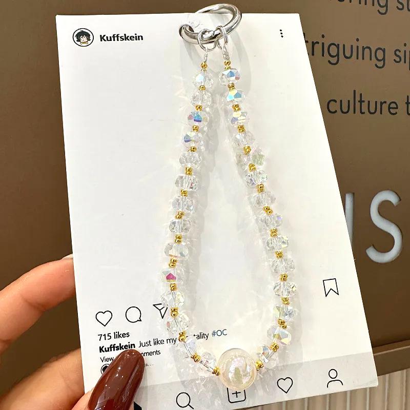 Elegant Telefonrem med Kristallpärlor och Nyckelringshänge