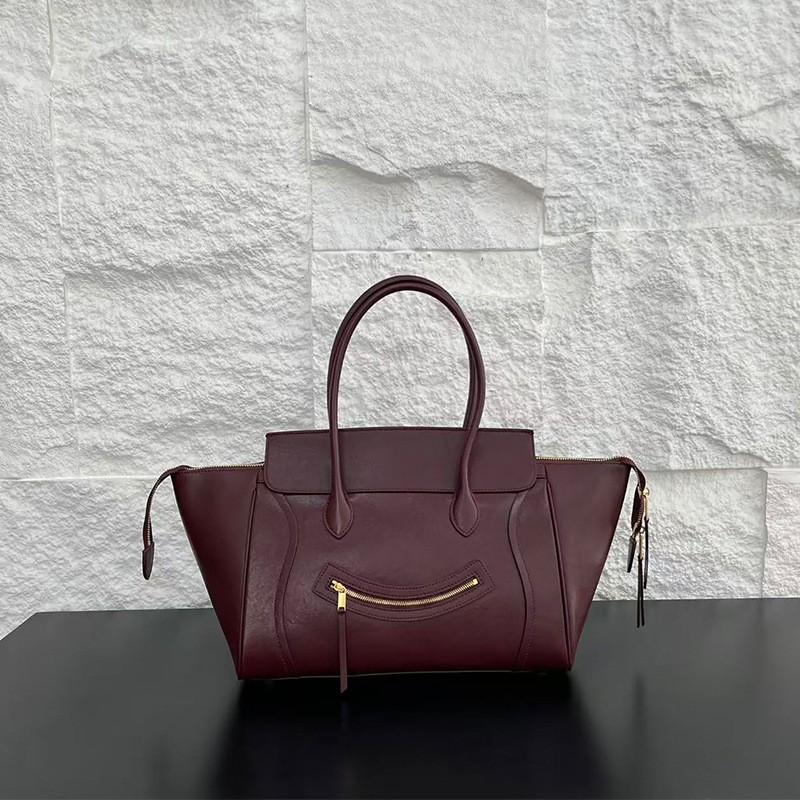 Handtasche Lachender Flügel Tasche Große Kapazität Weiches Leder Temperament Einfach Pendler Tragetasche Damen