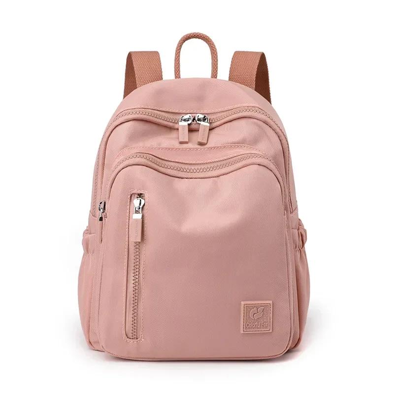 2025 New Nylon Splash Proof Large Capacity Backpack Women'S Outdoor Travel Waterproof Nylon Portable Schoolbag Man Travel Bag