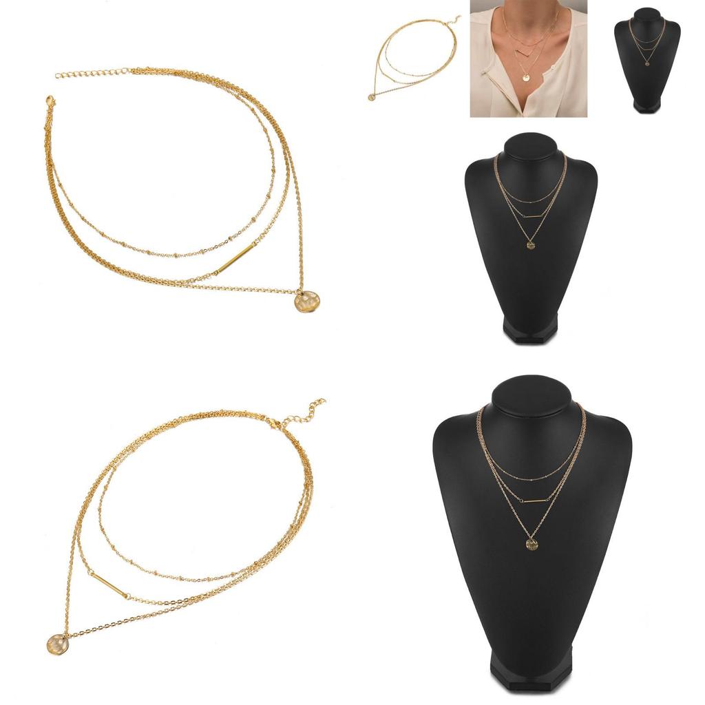 Elegant Multi-layered Gold Necklace Featuring Unique Geometric Shapes For Fashion Lovers