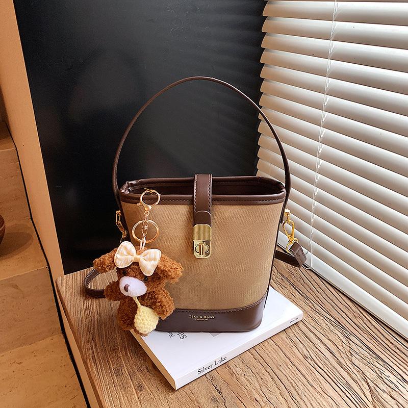 Retro casual texture contrasting color bucket bag 2025 autumn and winter new fashionable versatile simple portable shoulder messenger bag