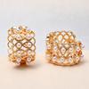 Elegant French Retro Pearl Hoop Earrings with Unique Hollow Metal Design
