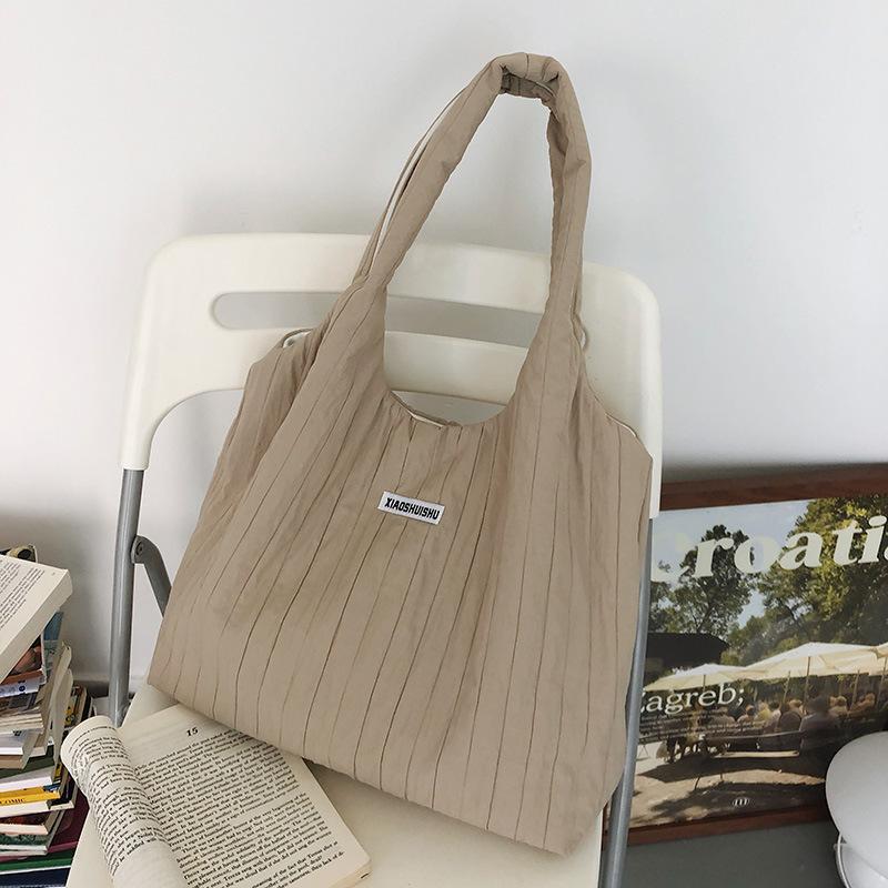 

Large capacity bag women s winter new fashion lightweight shoulder bag Korean version casual simple crossbody armpit handbag хакі