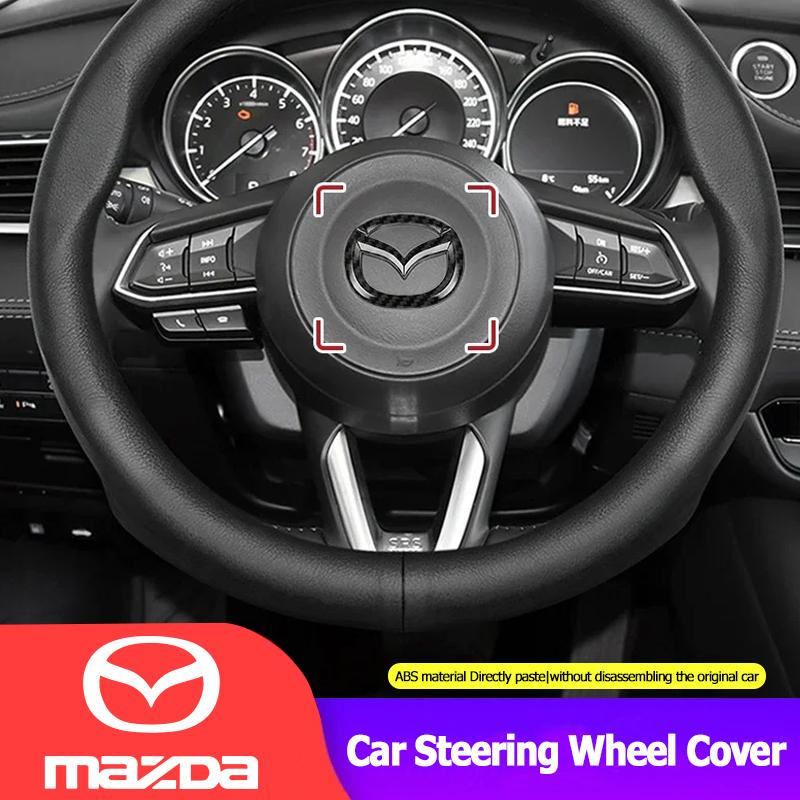 AAGI1 Car Steering Wheel Emblem Sticker Decoration Accessories For Mazda 2 3 6 5 Atenza CX3 CX5 MX5 CX7 Axela CX30 CX90 CX60 CX50 MX30