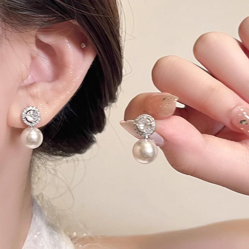 925 Silver Needle Pearl Earrings Women's High-end Sense Niche Temperament Bow Stud Earrings Retro Ear Jewelry Wholesale