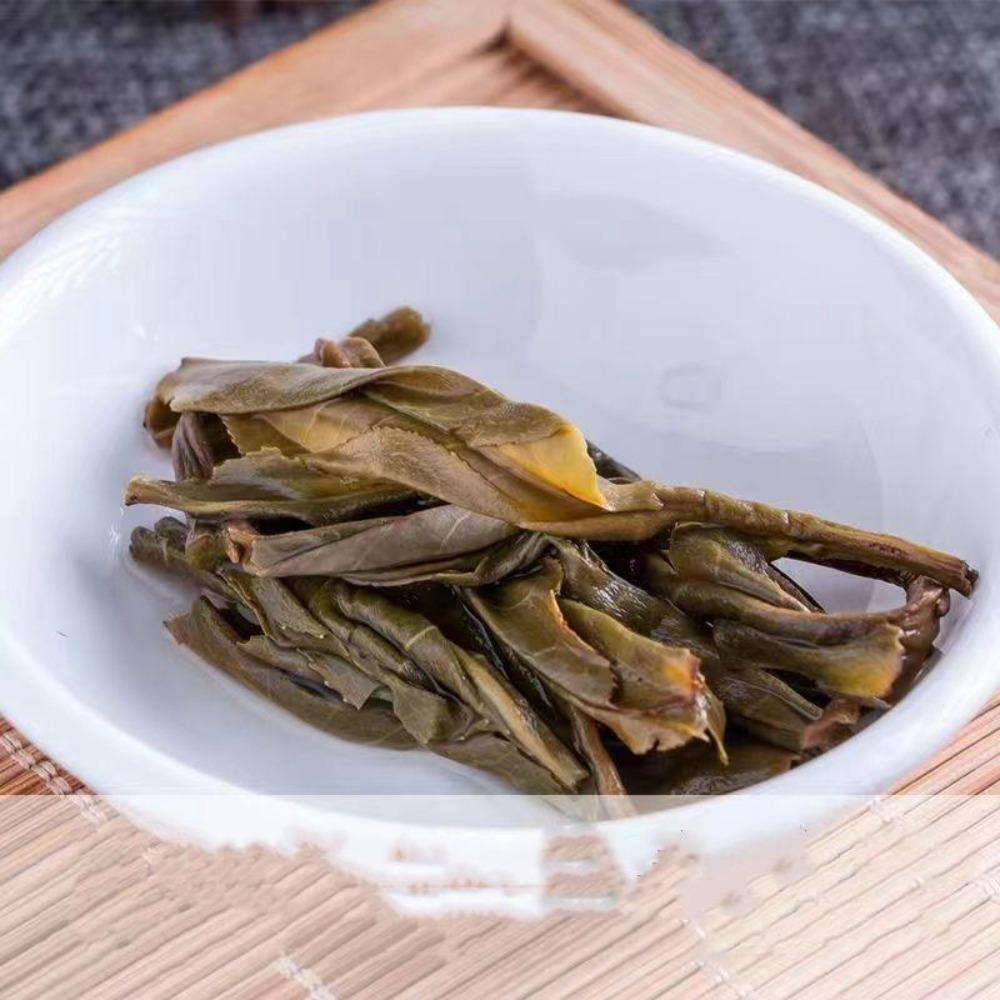 357g Menghai Laobanzhang Yunnan Roher Pu'er Tee Kuchen