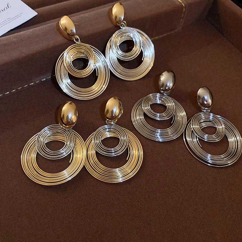 

Statement Silver Geometric Circle Earrings: European & American High-End Fashion for Women