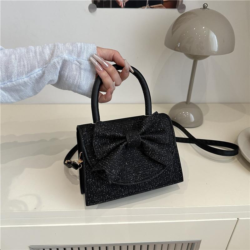 

Light luxury dinner versatile solid color small square bag women s personality casual fashion ball high sense temperament messenger bag чорний