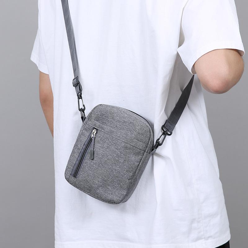 New Men's Shoulder Bag Nylon Lightweight Joker Mobile Phone Bag Women's Fashion Simple Travel Messenger Bag.