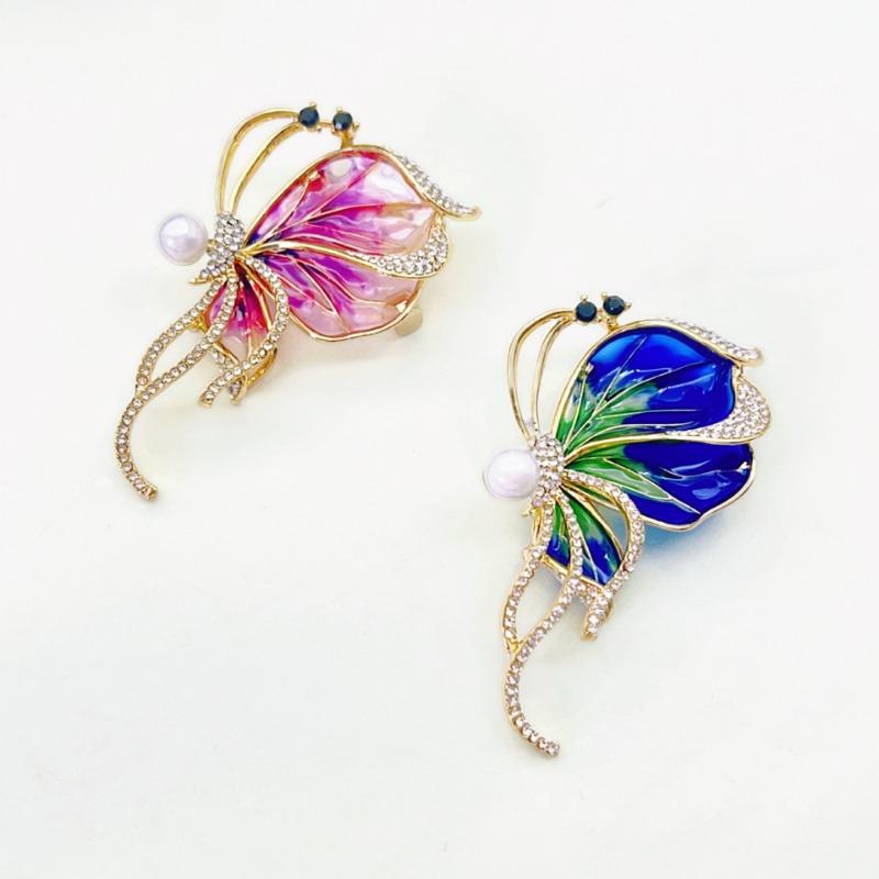 Butterfly Pearl Brooch - High-end Luxury Accessory for Clothing, Featuring A Slimming Waist Fastener, Anti-glare Fastener, and Pin Design.