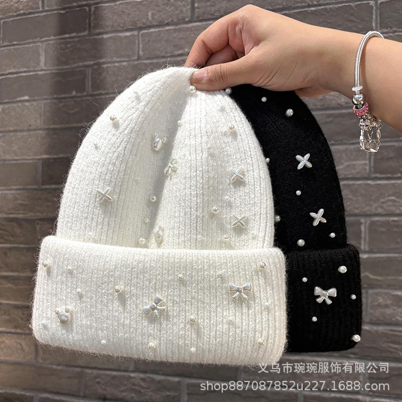 Autumn and winter new pearl bow light luxury wool hat women's big head circumference shows a small face, cold-proof ear protection knitted hat