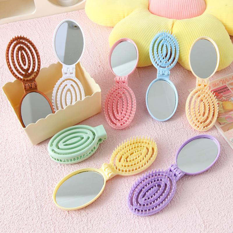 Portable Folding Hair Comb With Mirror, Lightweight & Travel-Friendly For On-The-Go Styling. A Perfect Gift For Women & Girls.