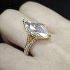 Elegant Pear-Shaped Zircon Ring with Diamond Accents - Women's Teardrop Design for Engagement or Wedding