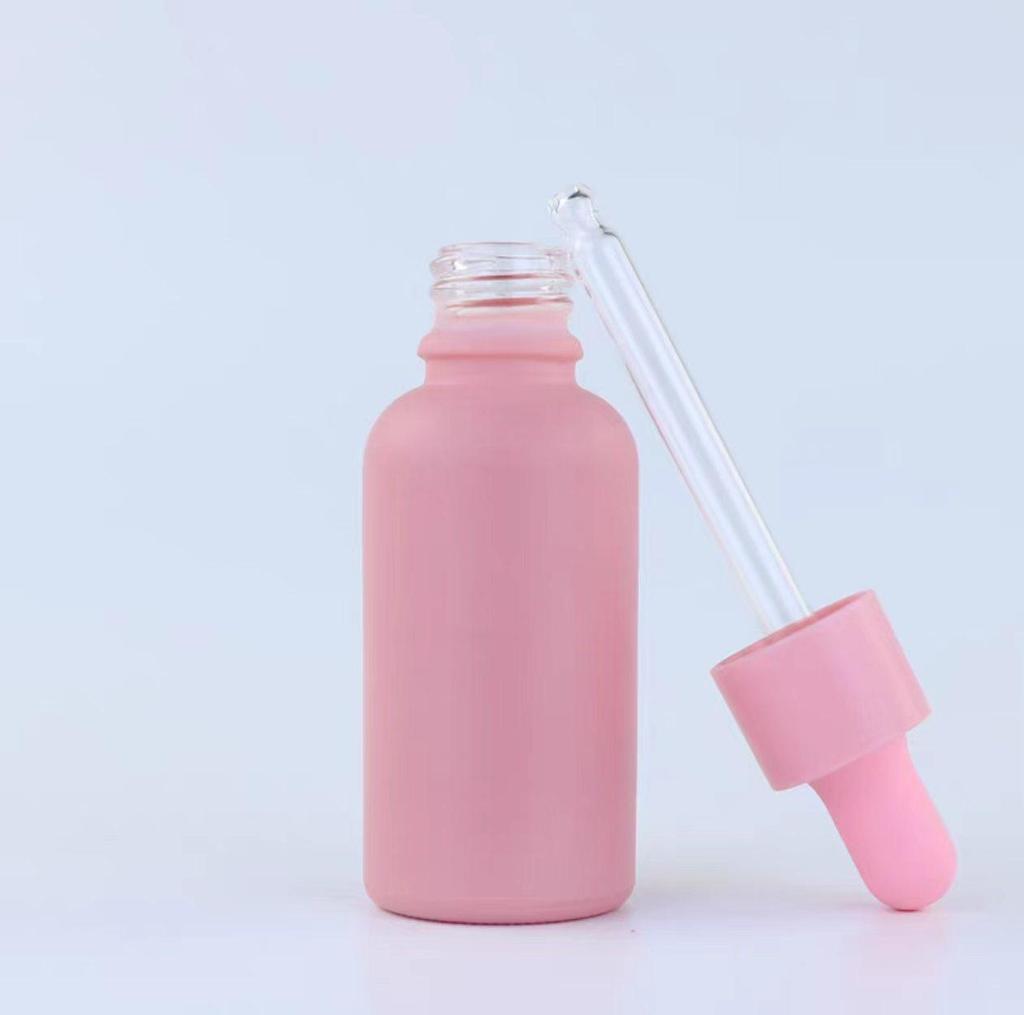 Sandblasted Pink Light-Blocking Glass Bottles: 20ml, 30ml, 50ml – Ideal for Cosmetics, Essential Oils, and Aromatherapy.