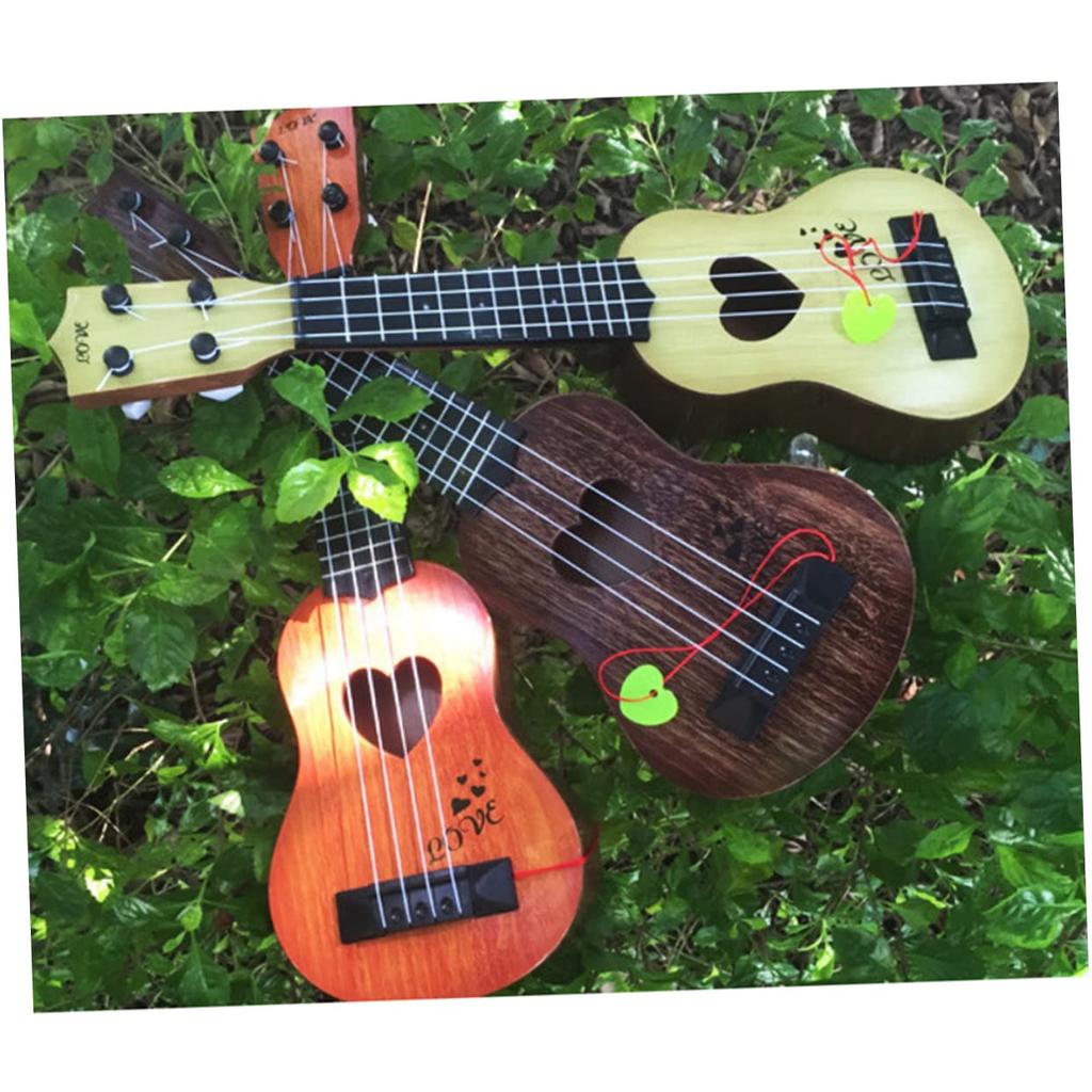 SEWACC Ukulele Plastic Mini Ukulele Mini Guitar for Children Acoustic Guitar 4 String Guitar Beginner Guitar Children Musical Instrument Play Easy To
