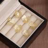 Gold Hollow Diamond-Encrusted Clover Fringed Earrings, High-End Light Luxury, Niche Fashion, Elegant And Exquisite Atmospheric Earrings