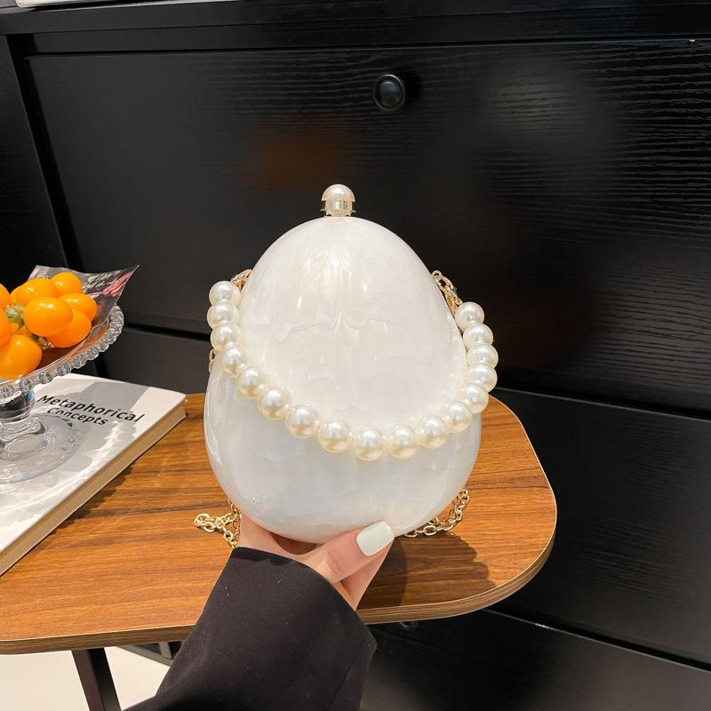 

Bag Bag Women s Bag 2025 New European and American Fashion Personality Acrylic Goose Egg Bag Beaded Handbox Bag Tide чорний