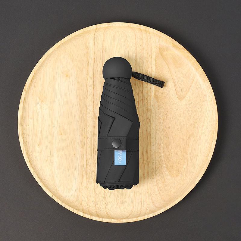 Parasol Capsule Sun Umbrella: 50% Off Mini UV Protection for Women, Dual-Purpose for Sun and Rain.