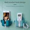 Úložný držák Multifunkční univerzální nástěnný úložný věšák na dálkové ovládání bez děrování pro domácnost