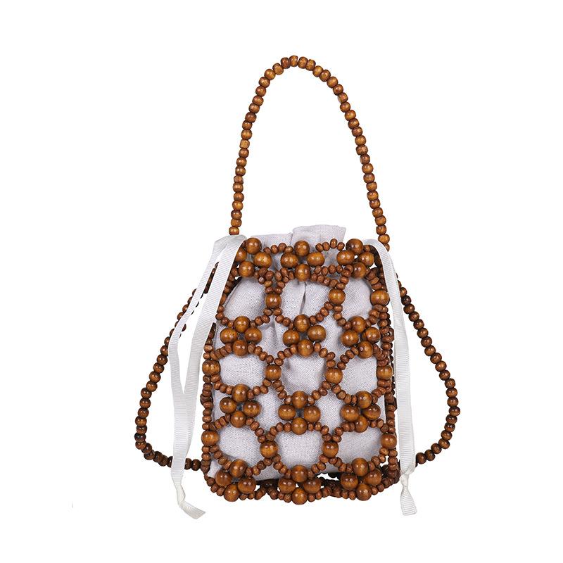 

Fashion Luxury Pearl Beaded Bag Hollow Out Bohemia Woven Bead underarm Bag with Inner Bag Handmade Small Phone Pouch Shopping