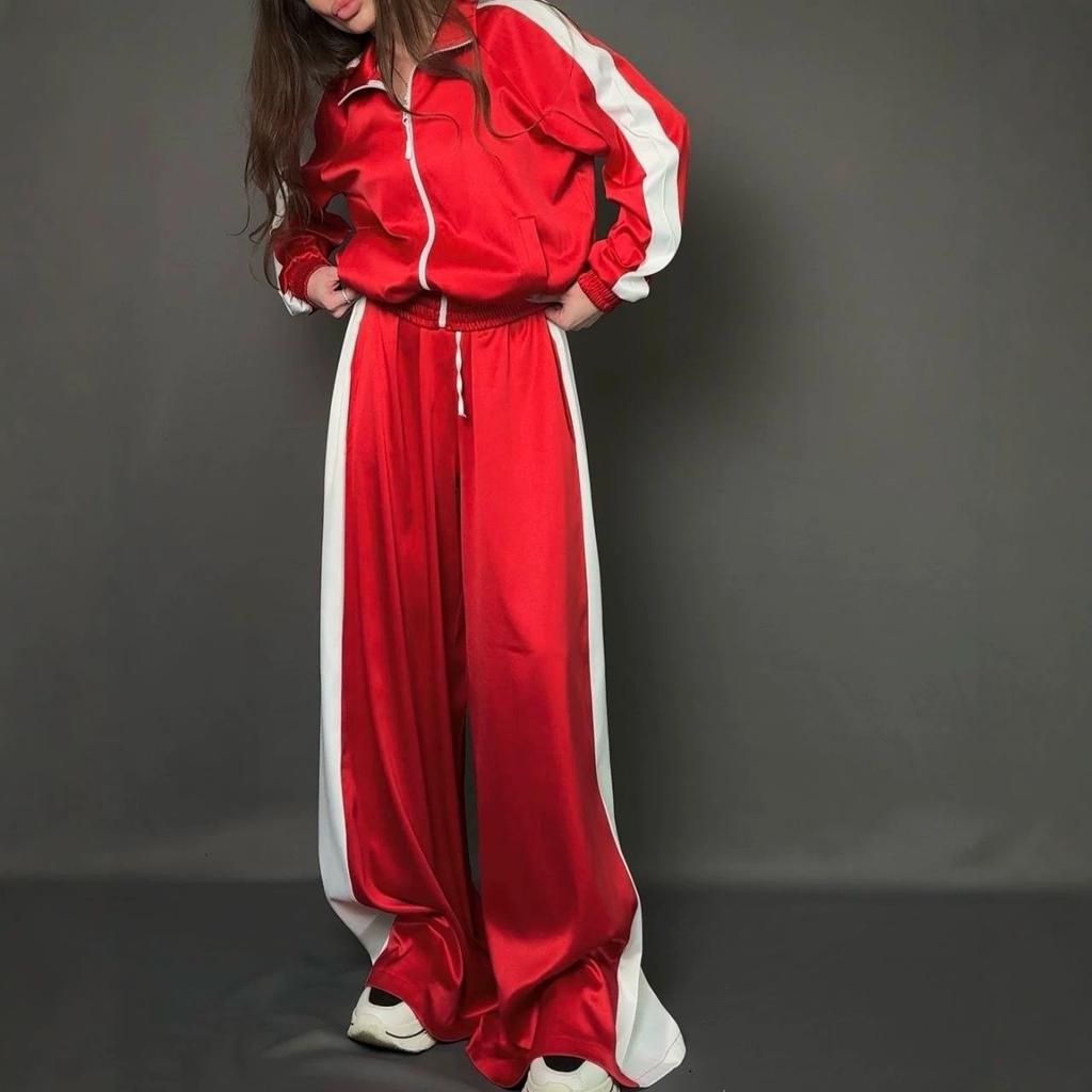 Tuta sportiva retro europea e americana con striscia laterale in raso, giacca con cerniera a collo semi-dolcevita a maniche lunghe, pantaloni a vita alta a gamba larga