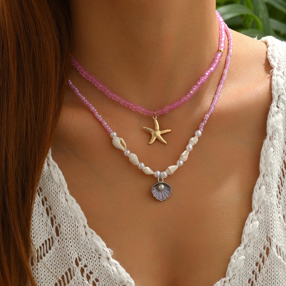 

Sweater accessories necklace, European and American ins wind shell alloy neck chain, purple rice bead layered necklace.
