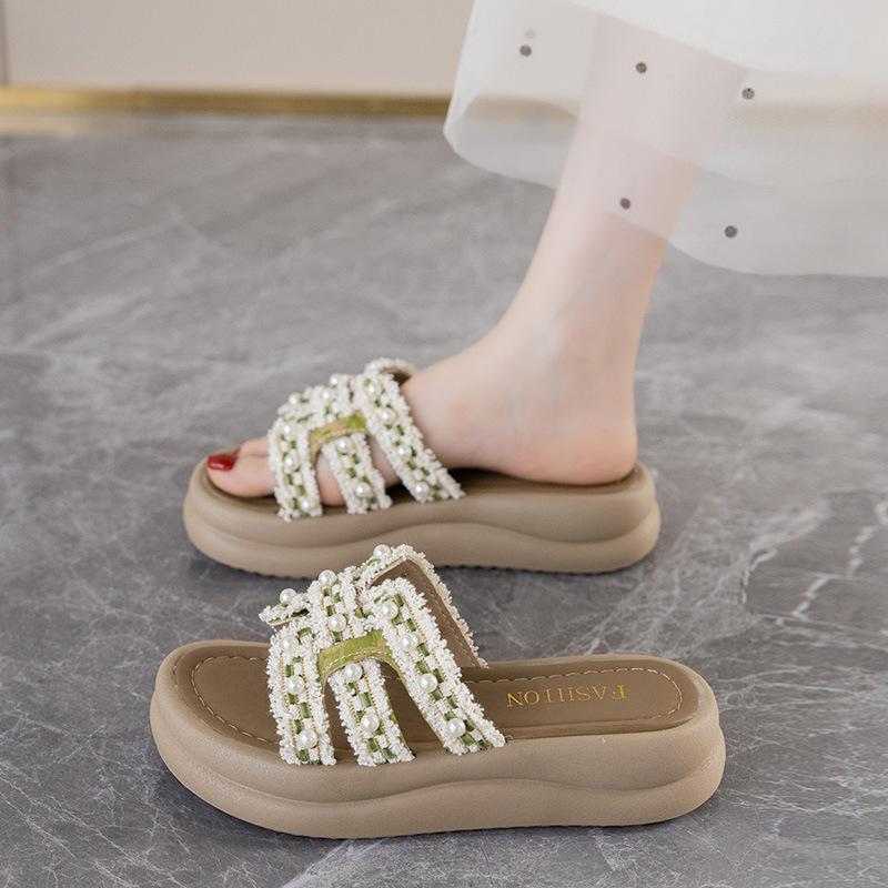 Thick-soled slippers women's summer outer wear with skirts 2025 new soft-bottomed beach pearls heightened one-word cool slippers
