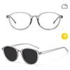 Retro Oval Blue Light Glasses with Smart Photochromic Lenses for Clear Vision and Eye Protection.