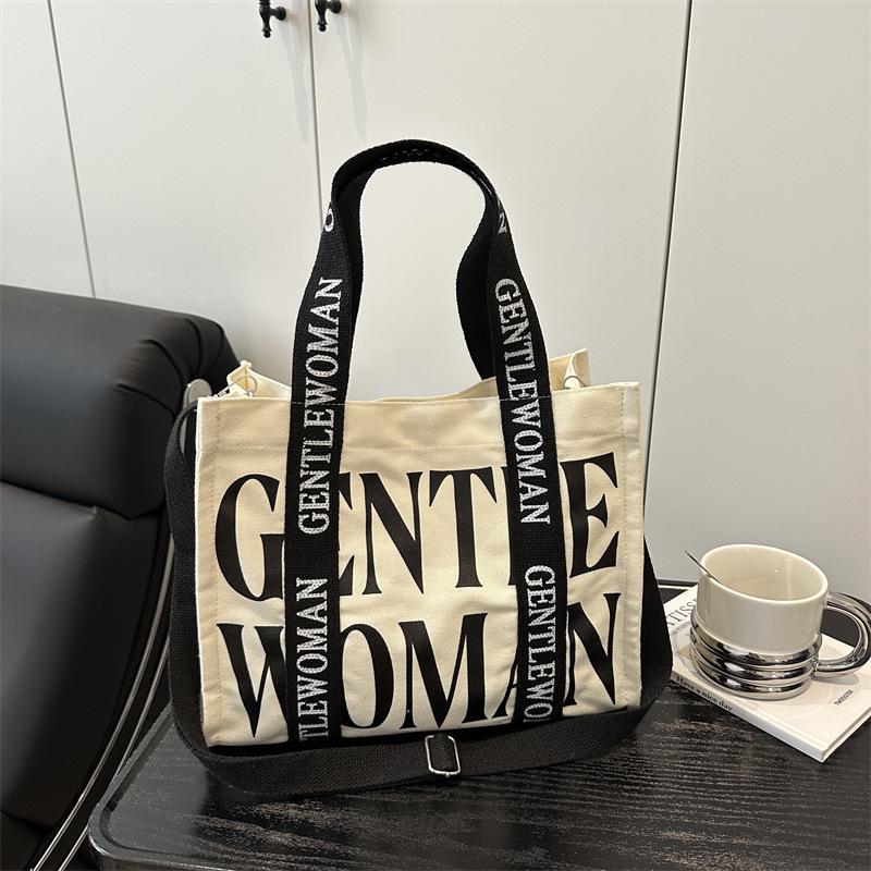 2025 Women's Color-Blocking Canvas Handbag: Trendy Crossbody & Shoulder Bag with Colorful Strap