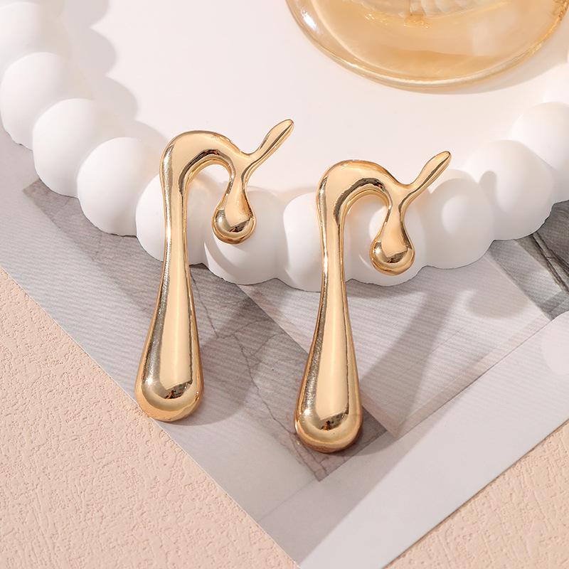 Exaggerated personality double-layer five-petaled flower earrings, simple retro striped leaf fringed earrings