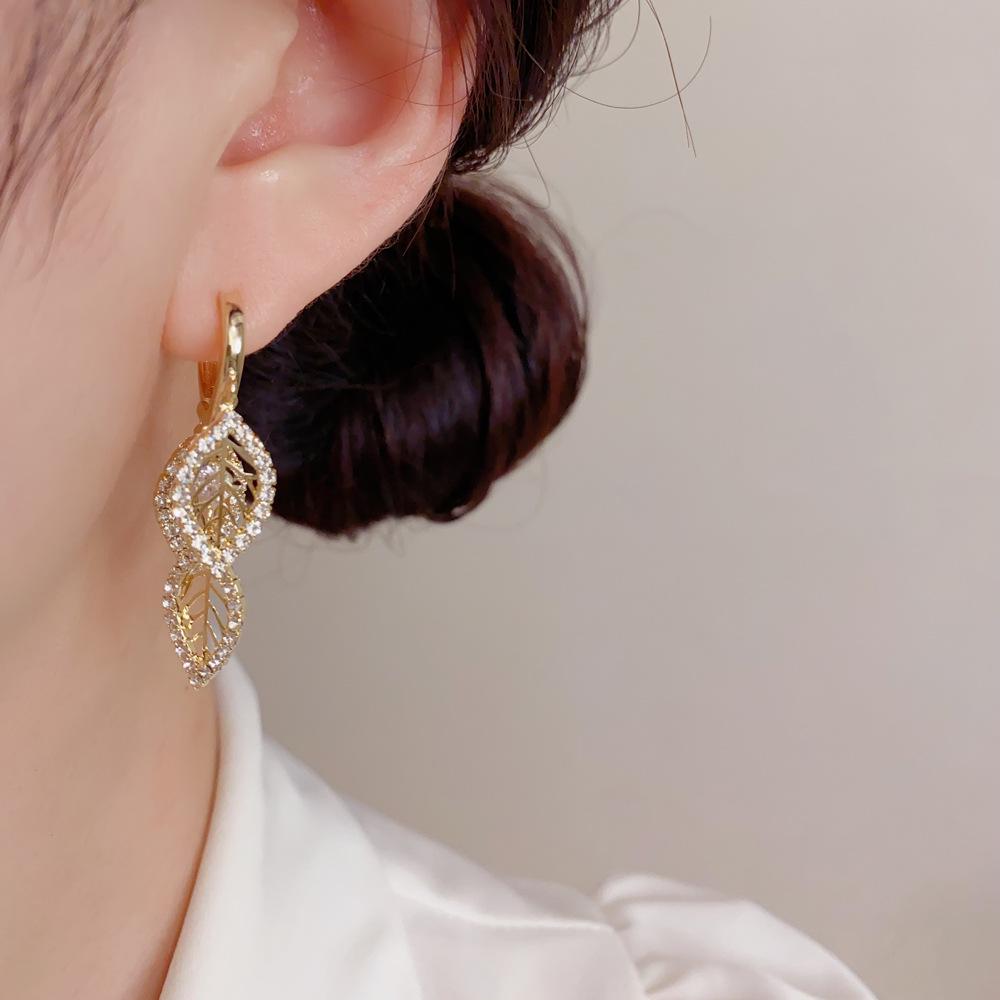 Euro-American Luxury Zirconia Leaf Tassel Earrings for Women - Unique, Shiny, and Stylish Design