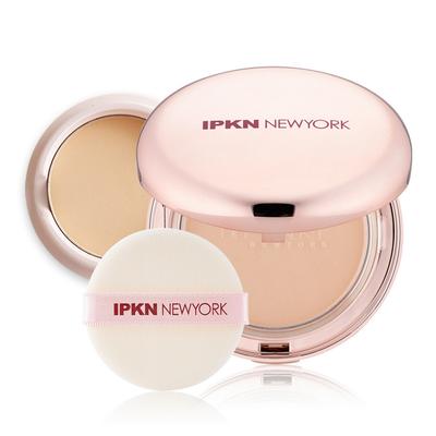 Base de maquillaje compacta acabado satinado producto principal + recambio / Función de protección UV