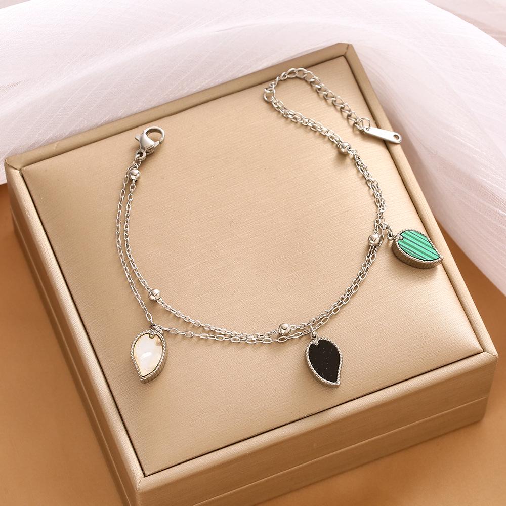 High-End Titanium Steel Four-Leaf Clover Bracelet with Shell Pendant – Durable, Fade-Resistant Design